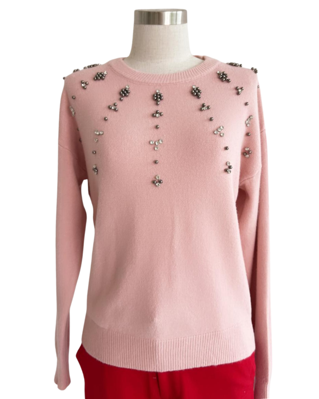 Blusa tipo sweater con perlas y tachas