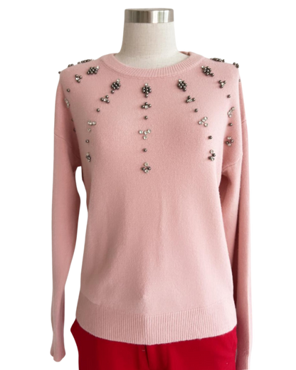 Blusa tipo sweater con perlas y tachas