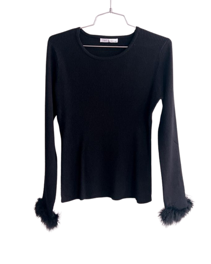 Blusa plumas manga larga