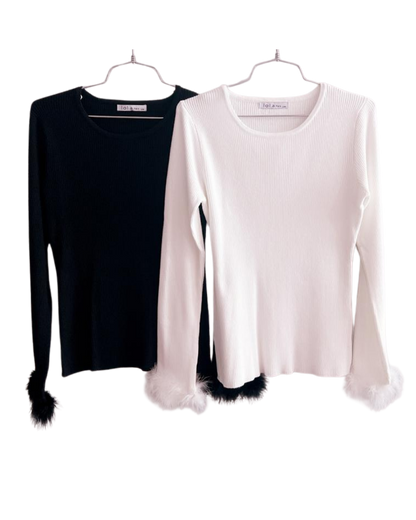 Blusa plumas manga larga