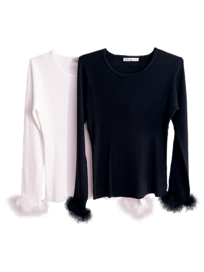 Blusa plumas manga larga