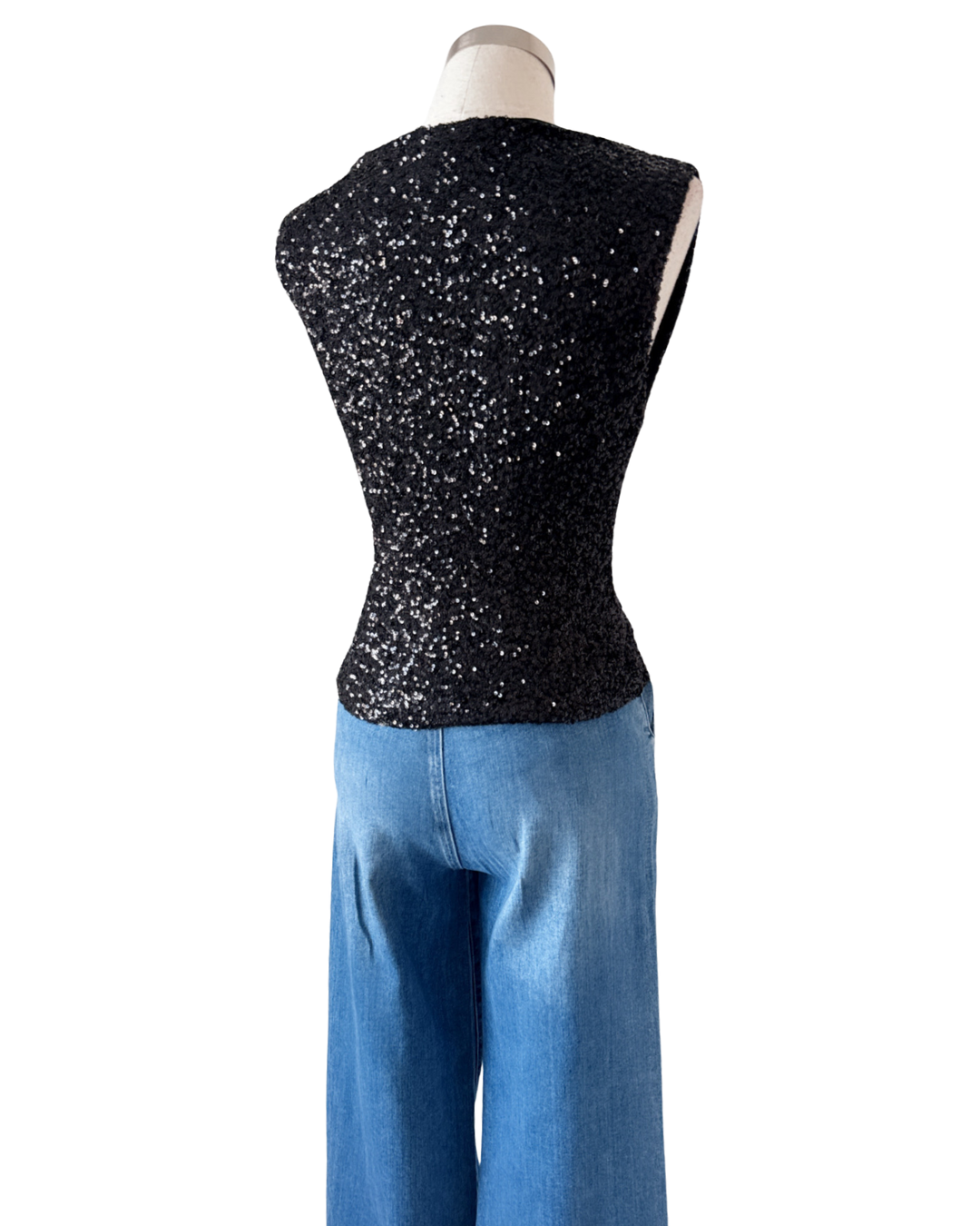 Blusa brillos negra y plata