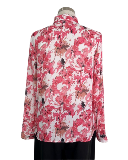 Blusa strech tela asedada estampada.Pantalón talle alto.