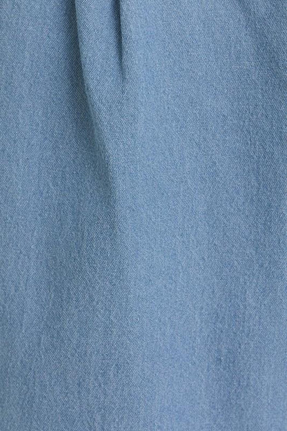 Jeans algodón con botón frontal