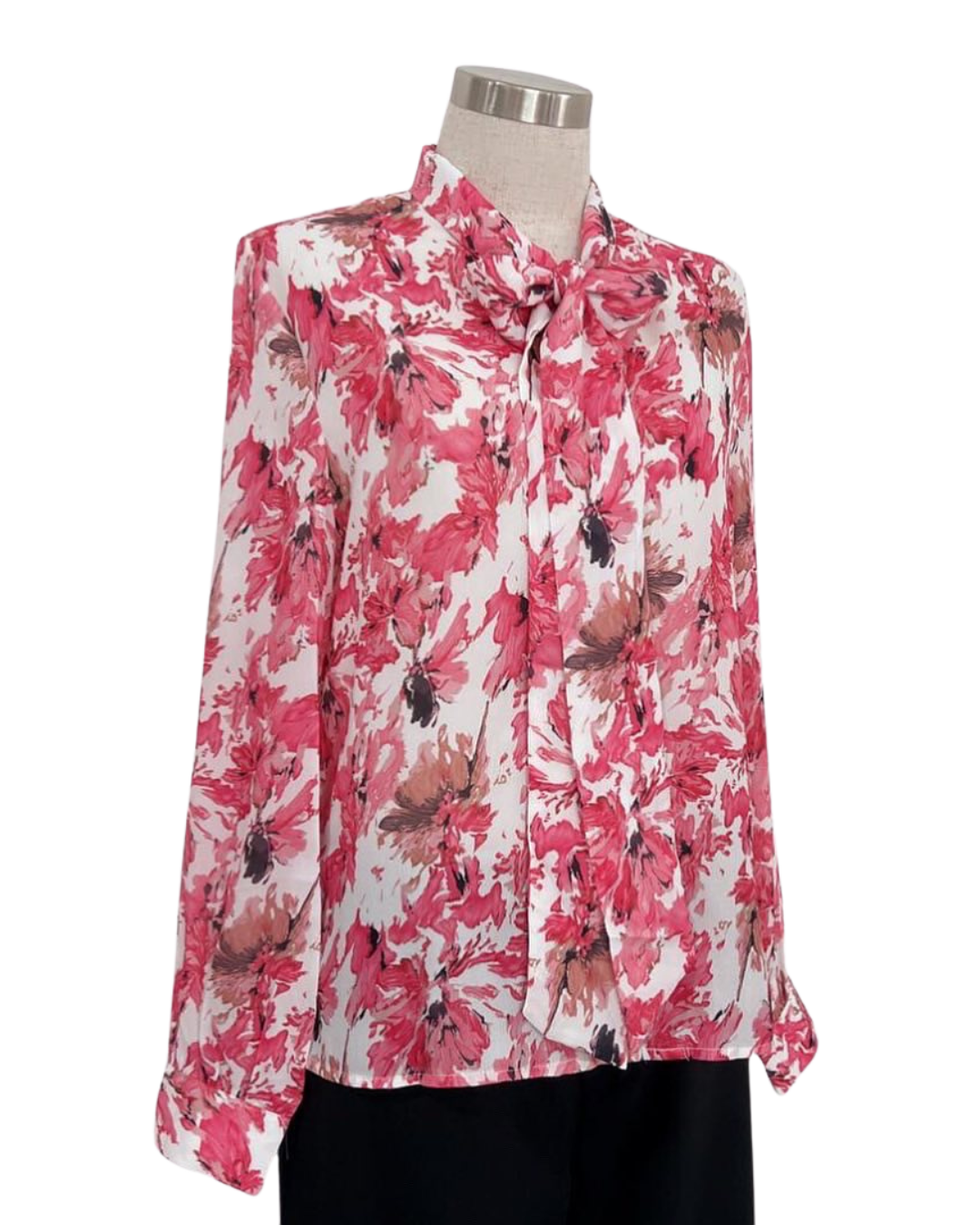 Blusa strech tela asedada estampada.Pantalón talle alto.