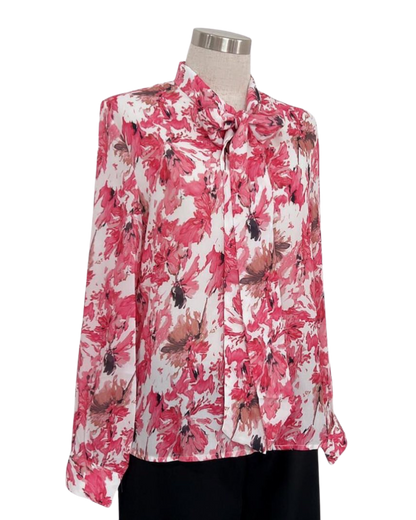 Blusa strech tela asedada estampada.Pantalón talle alto.